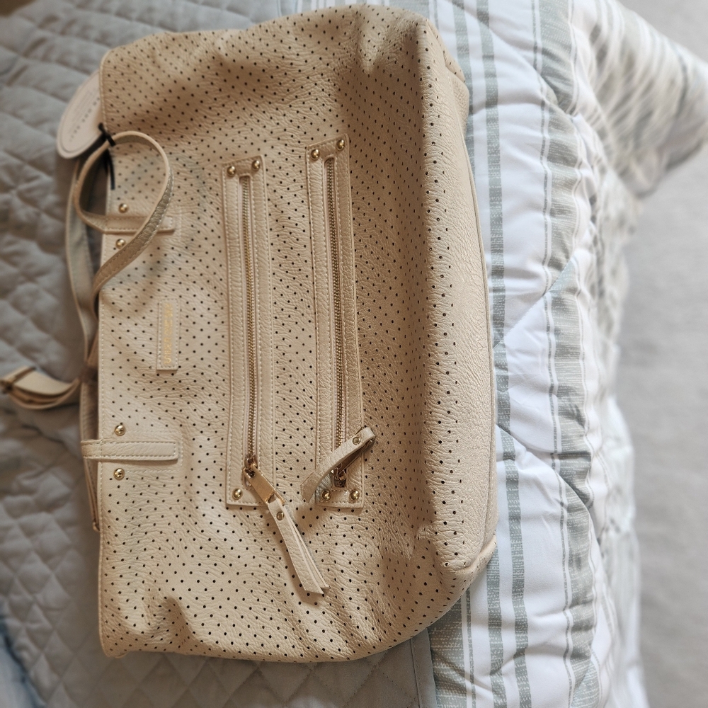 Under One Sky tan purse. Four zippers two inside and two outside. Dots design - Picture 7 of 7